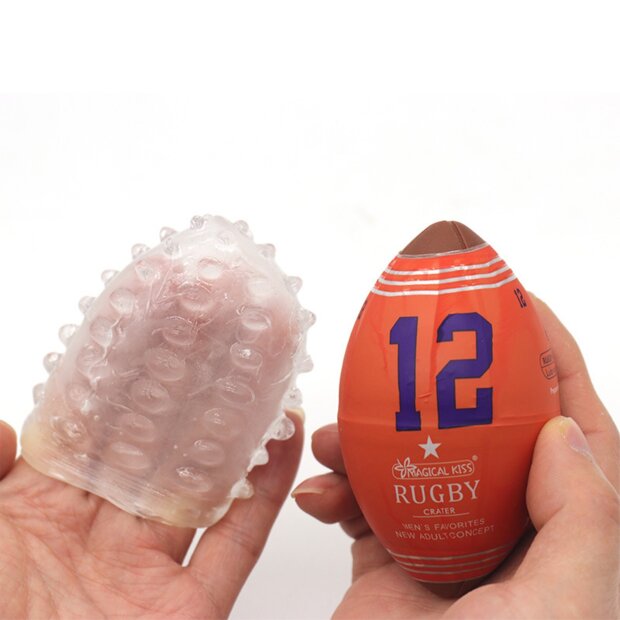 SuckMeToys Masturbateur en forme de ballon de rugby texturé
