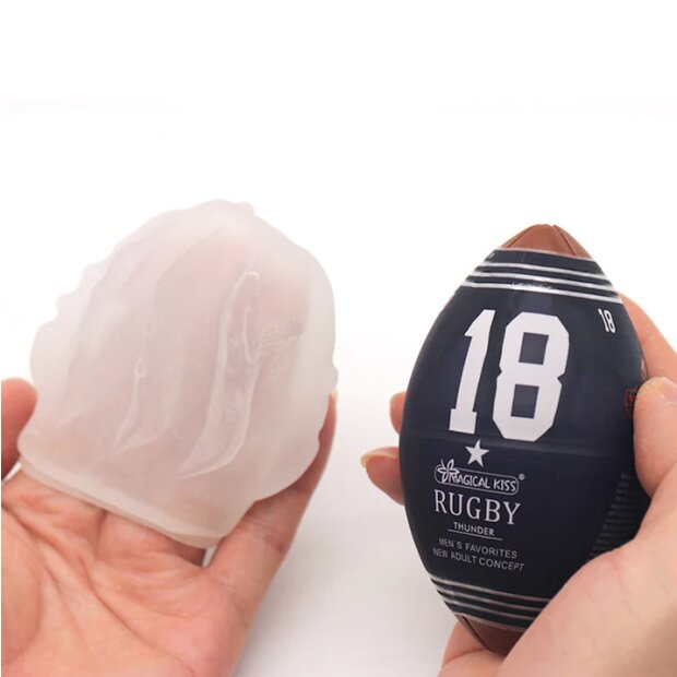 SuckMeToys Masturbator in the shape of a textured rugby ball